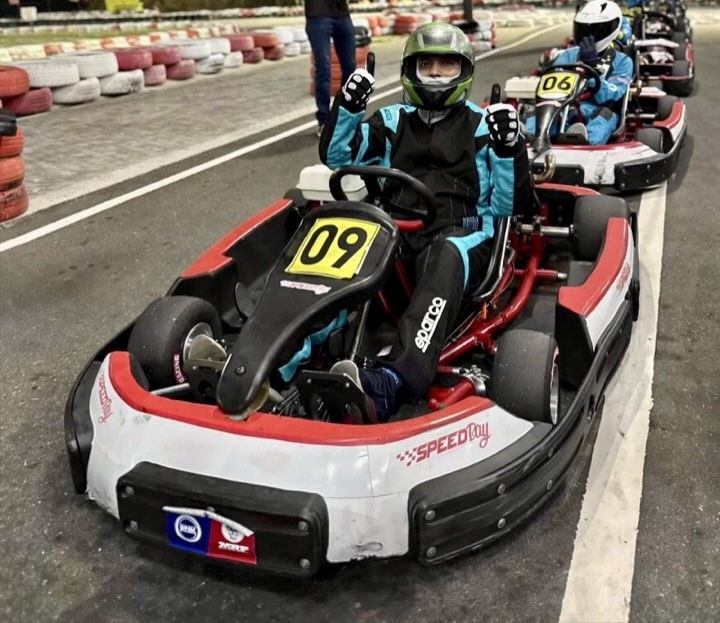Haneez in a racing kart on the starting grid